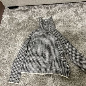 Black and white turtle neck sweater. Size small.